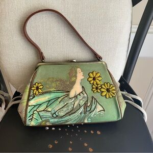 Isabella Fiore green fairy purse.